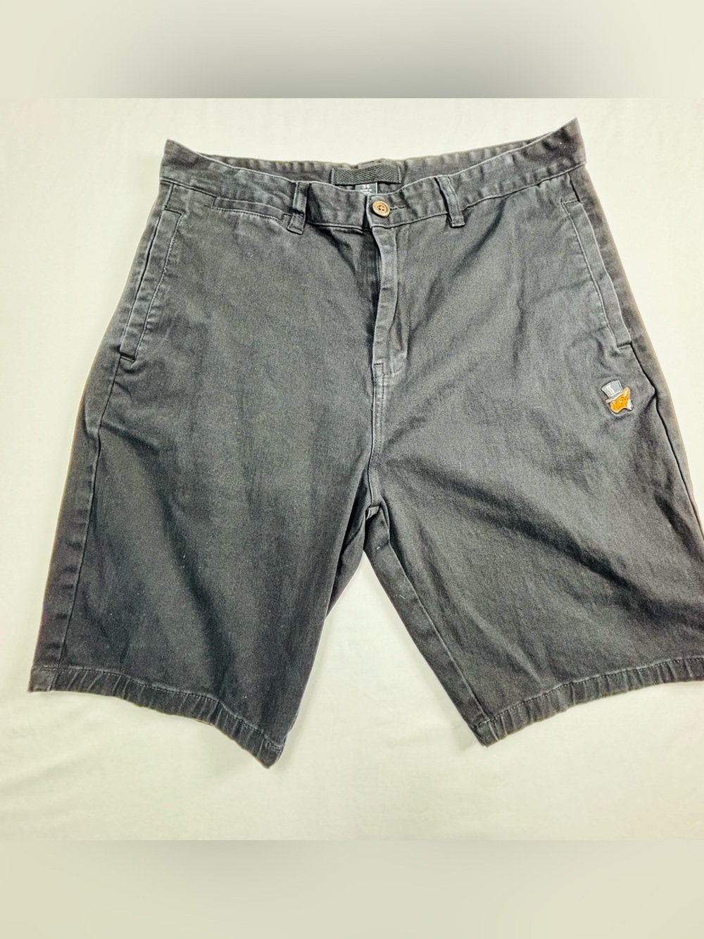 Akoo Men's Charcoal Black Flat-Front Shorts with Subtle Patch